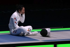South Korean fencer Shin A Lam sits in protest at loss