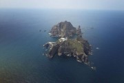 The contested islands lie in the East Sea, and are named Dokdo by Koreans, and Takeshima by Japan.